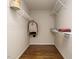 Spacious walk-in closet featuring custom shelving and ample storage space at 1035 Evening Shade Ave, Rolesville, NC 27571