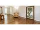 Cozy living room with hardwood floors, natural light, and neutral walls at 1035 Evening Shade Ave, Rolesville, NC 27571