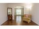 Comfortable living room with hardwood floors, natural light, and neutral walls at 1035 Evening Shade Ave, Rolesville, NC 27571