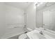 Bright bathroom features a tub and shower combination with a single sink at 110 Virens Dr, Cary, NC 27511