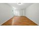 A spacious bedroom features hardwood floors and double-door closets at 110 Virens Dr, Cary, NC 27511