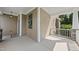 Inviting covered porch with craftsman details, decorative wreath, and ample space for seating at 1123 Ambrose Dr, Rolesville, NC 27571
