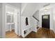 Welcoming entryway with built-in bench, storage, and a convenient half bathroom at 1123 Ambrose Dr, Rolesville, NC 27571