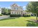 Charming two-story home with manicured lawn, neutral siding and black shutters at 1123 Ambrose Dr, Rolesville, NC 27571