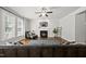 Inviting living room with a fireplace, comfortable seating, and plenty of natural light at 1123 Ambrose Dr, Rolesville, NC 27571