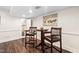Basement lounge area with a cozy table and chairs, plus a cue rack for your billiard accessories at 11571 Auldbury Way, Raleigh, NC 27617