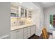Bright kitchen features granite countertops, cream cabinetry, and tile backsplash at 11571 Auldbury Way, Raleigh, NC 27617