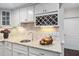 Kitchen featuring stainless steel sink, granite countertops, and wine rack at 11571 Auldbury Way, Raleigh, NC 27617