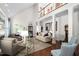 Spacious living room with high ceilings, hardwood floors, and stylish furnishings at 11571 Auldbury Way, Raleigh, NC 27617