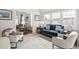 Comfortable living room with lots of natural light and views to the dining room at 11571 Auldbury Way, Raleigh, NC 27617