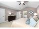 Spacious main bedroom with en-suite bathroom featuring neutral colors and ample natural light at 11571 Auldbury Way, Raleigh, NC 27617