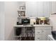 Bright office with custom cabinets and shelves provides the perfect work space at 11571 Auldbury Way, Raleigh, NC 27617