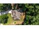 Aerial view of home showcasing the roof, driveway, and lush surroundings at 149 Hadley Ln, Clayton, NC 27527