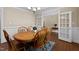 Formal dining room featuring a wooden table with chairs, a hutch, and bright white trim at 149 Hadley Ln, Clayton, NC 27527