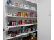 A well-stocked pantry shows ample shelving for storage, offering an organized space at 149 Hadley Ln, Clayton, NC 27527