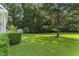 A large lot with a backyard in a park-like setting, perfect for outdoor entertaining at 150 Williamston Ridge Dr, Youngsville, NC 27596