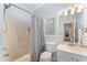 Bathroom featuring a shower-tub combo, toilet, and vanity with marble countertop at 150 Williamston Ridge Dr, Youngsville, NC 27596