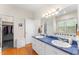 This large bathroom features a double vanity, an enclosed shower, and a walk-in closet at 150 Williamston Ridge Dr, Youngsville, NC 27596
