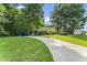Well-maintained home with a spacious driveway and beautiful landscaping at 150 Williamston Ridge Dr, Youngsville, NC 27596