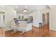 Bright kitchen with blue countertops, stainless steel appliances, and hardwood floors at 150 Williamston Ridge Dr, Youngsville, NC 27596