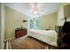 Bedroom with neutral walls and carpet, ceiling fan, with lots of natural light at 1909 Piperwood Ct, Durham, NC 27713