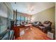 Inviting living room with hardwood floors, neutral paint, comfortable seating, and ample natural light at 1909 Piperwood Ct, Durham, NC 27713