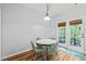 Dining area with table, chairs, and an exit to the backyard at 2833 Gross Ave, Wake Forest, NC 27587