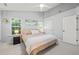 Spacious main bedroom with vaulted ceilings, a ceiling fan, and large windows at 2833 Gross Ave, Wake Forest, NC 27587