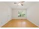 Bedroom with closet and large window overlooking landscaping at 2849 Rue Sans Famille, Raleigh, NC 27607