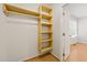 Walk-in closet featuring custom wood shelves at 2849 Rue Sans Famille, Raleigh, NC 27607