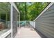 Spacious deck featuring outdoor dining set and view of trees at 2849 Rue Sans Famille, Raleigh, NC 27607