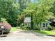 Charming home exterior with well-manicured lawn and inviting driveway at 2849 Rue Sans Famille, Raleigh, NC 27607
