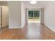 Dining room with sliding glass doors to the patio and wood-look vinyl flooring at 2932 Bramblegate Dr, Mebane, NC 27302