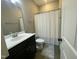 Bathroom featuring a vanity, toilet, shower with curtain, and neutral color scheme at 3 Meadowrue Ln, Youngsville, NC 27596