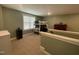 Cozy bedroom with carpet, bunk beds, and a window offering natural light at 3 Meadowrue Ln, Youngsville, NC 27596