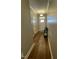 Bright entryway with hardwood floors, coat closet, and front door, offering a warm welcome at 3 Meadowrue Ln, Youngsville, NC 27596