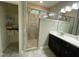 Modern main bathroom with tiled walk-in shower and double sink vanity, perfect for your morning routine at 3 Meadowrue Ln, Youngsville, NC 27596