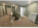 Hallway with carpet flooring leading to rooms, featuring white dresser in view at 3 Meadowrue Ln, Youngsville, NC 27596