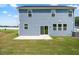 The home's backyard includes a concrete patio and plenty of green space at , Fuquay Varina, NC 27526