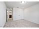 A bright bedroom featuring carpet flooring, a double closet, and an ensuite bath access at , Fuquay Varina, NC 27526
