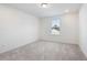 A clean and spacious bedroom with carpet flooring and a window for plenty of natural light at , Fuquay Varina, NC 27526