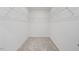 Empty walk-in closet featuring neutral carpet and wire shelving at , Fuquay Varina, NC 27526
