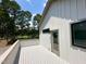 View from the deck of the house, looking out to the treelined backyard at 333 Merrywood Dr, Raleigh, NC 27610