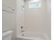 Bathroom displaying modern tiled shower and a separate soaking tub at 333 Merrywood Dr, Raleigh, NC 27610