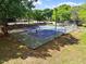 Overhead shot of Roberts Park tennis courts; fully enclosed and well-maintained at 333 Merrywood Dr, Raleigh, NC 27610