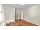 Bedroom featuring wood floors, natural lighting, and neutral paint at 3701 Oak Grove Church Rd, Mebane, NC 27302
