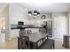 Bright eat-in kitchen with stainless steel appliances, white cabinetry, and generous counterspace at 3814 Tyler Bluff Ln, Raleigh, NC 27616