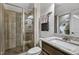 Bathroom with tiled shower and granite countertop at 39 Wood Stork Ct, Clayton, NC 27520