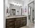 Bathroom with double doors and granite countertops at 39 Wood Stork Ct, Clayton, NC 27520