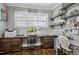 Well-appointed office with built-in desk, hardwood floors, and ample shelving at 39 Wood Stork Ct, Clayton, NC 27520